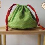 Reversible drawstring pouch..